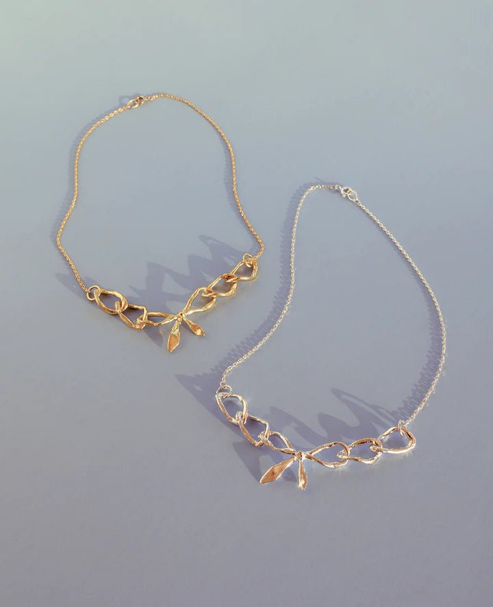 ORA - C Bow Realis Necklace (Brass) - Victoire BoutiqueORA - CNecklaces Ottawa Boutique Shopping Clothing